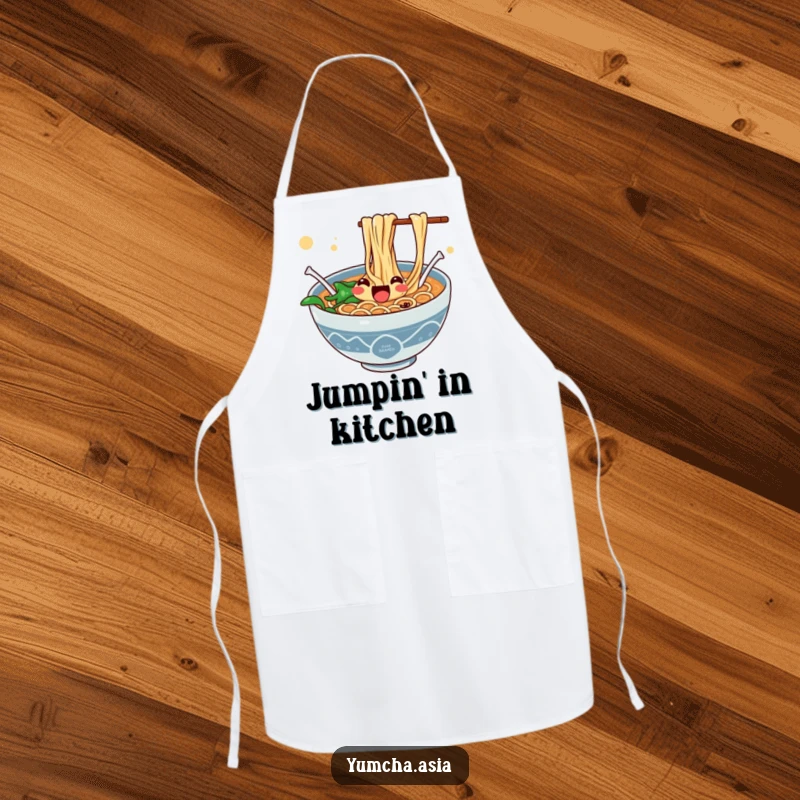 Funny apron showcasing a jubilant ramen bowl with noodles enthusiastically jumping, ready for culinary fun.